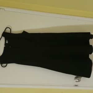 Sleeveless black Calvin Klein dress. Length 38" and bust 18". Fit and flare